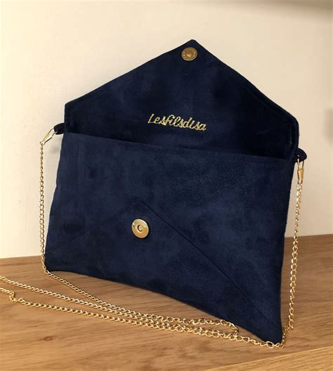 navy blue suede clutch bag